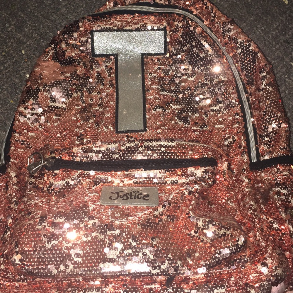 Cute T backpack with stains on the back